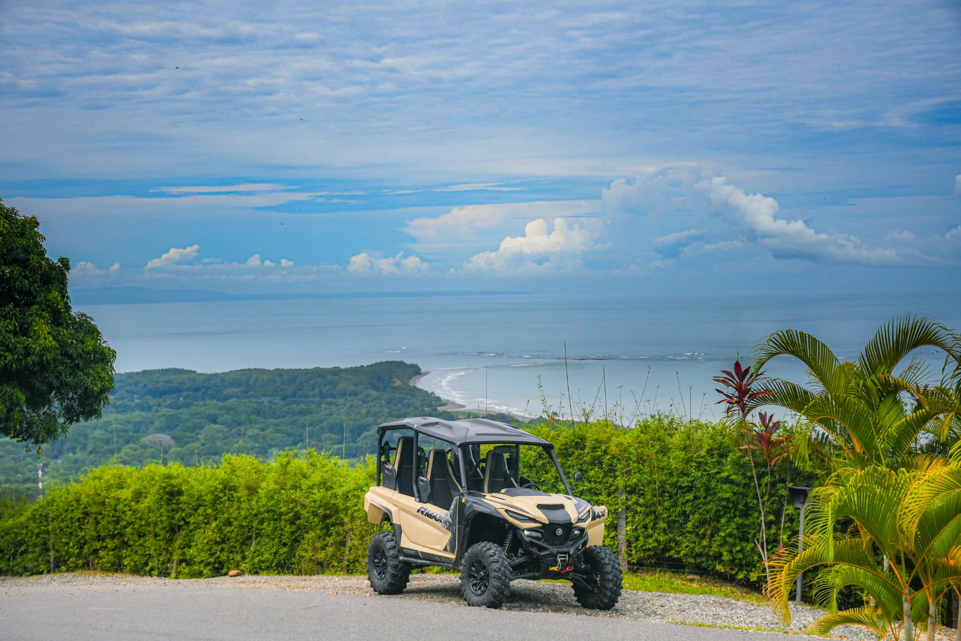 Side-by-side at a coastal viewpoint in Uvita